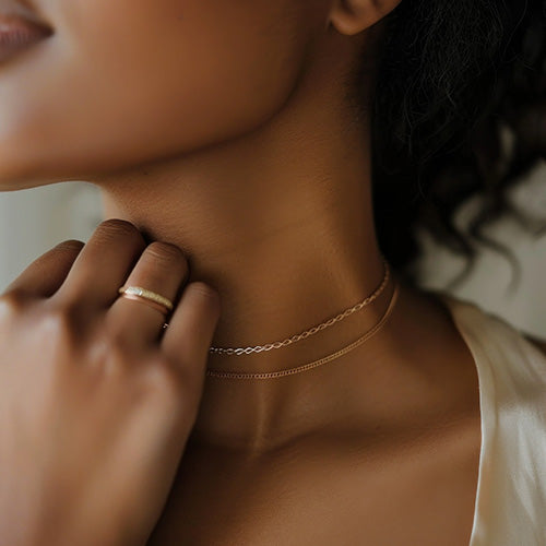 14K Yellow Twisted Wheat Chain on woman
